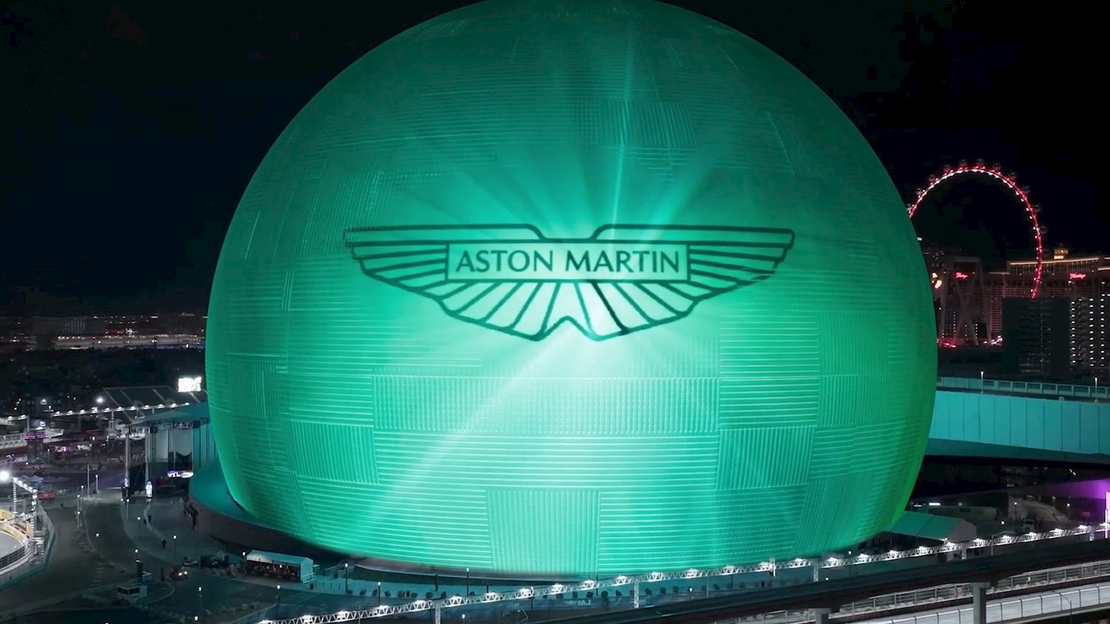 The Las Vegas Sphere coloured in green with the Aston Martin logo on it