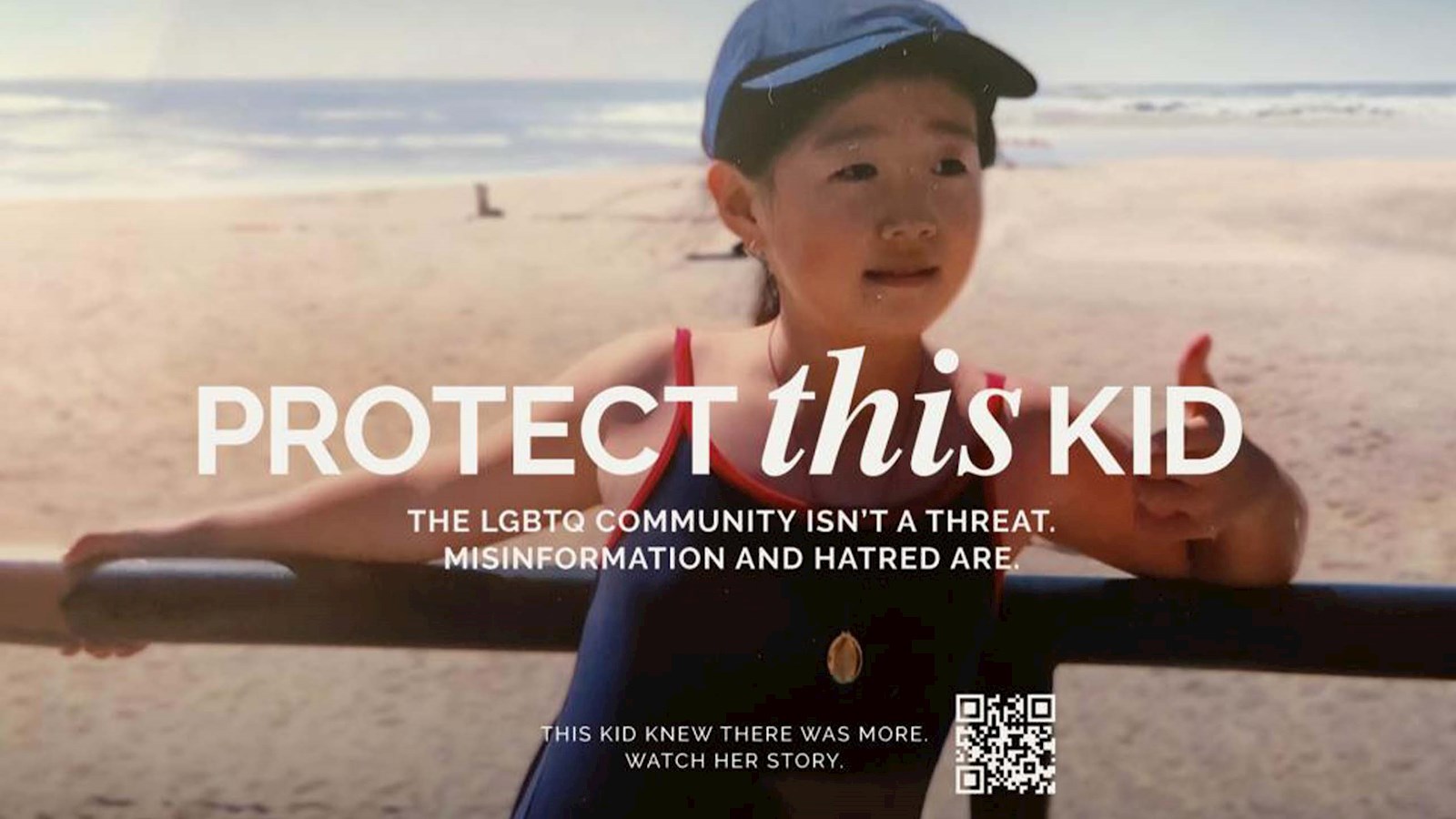 Young girl at the beach with white text overlay saying 'Protect this kid: The LGBTQ community isn't a threat. Misinformation and hatred are." 